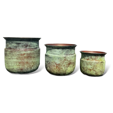 copper patina planter bowls by porch view home