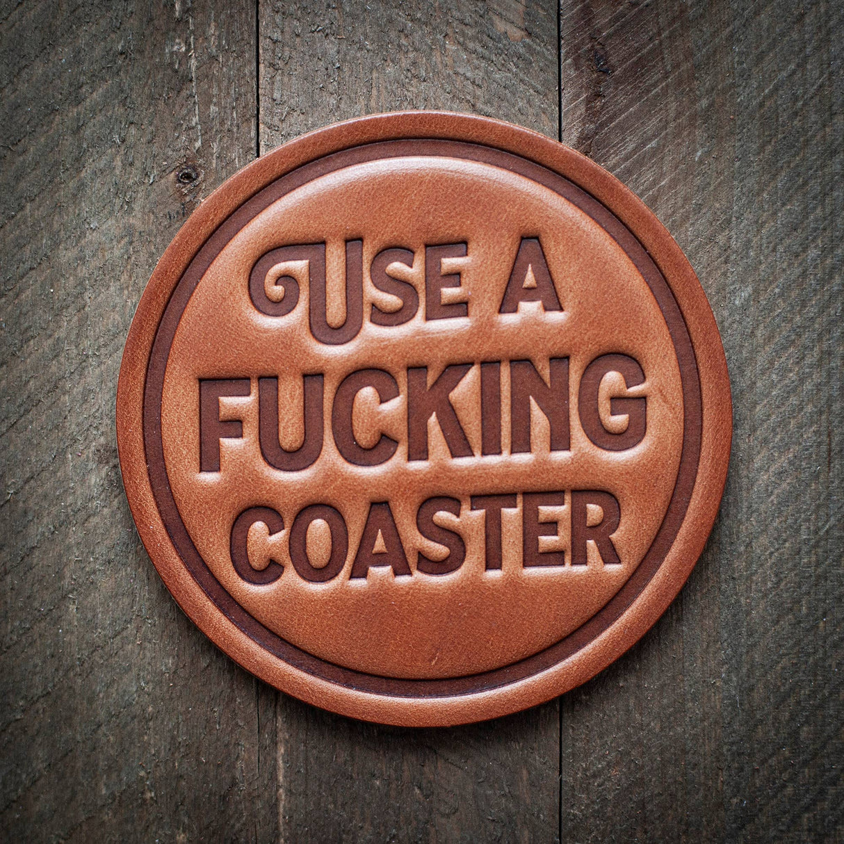 use a fucking coaster leather 