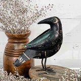 black crow displayed inside a home