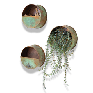 Antique distressed patina copper wall pockets by Kalalou