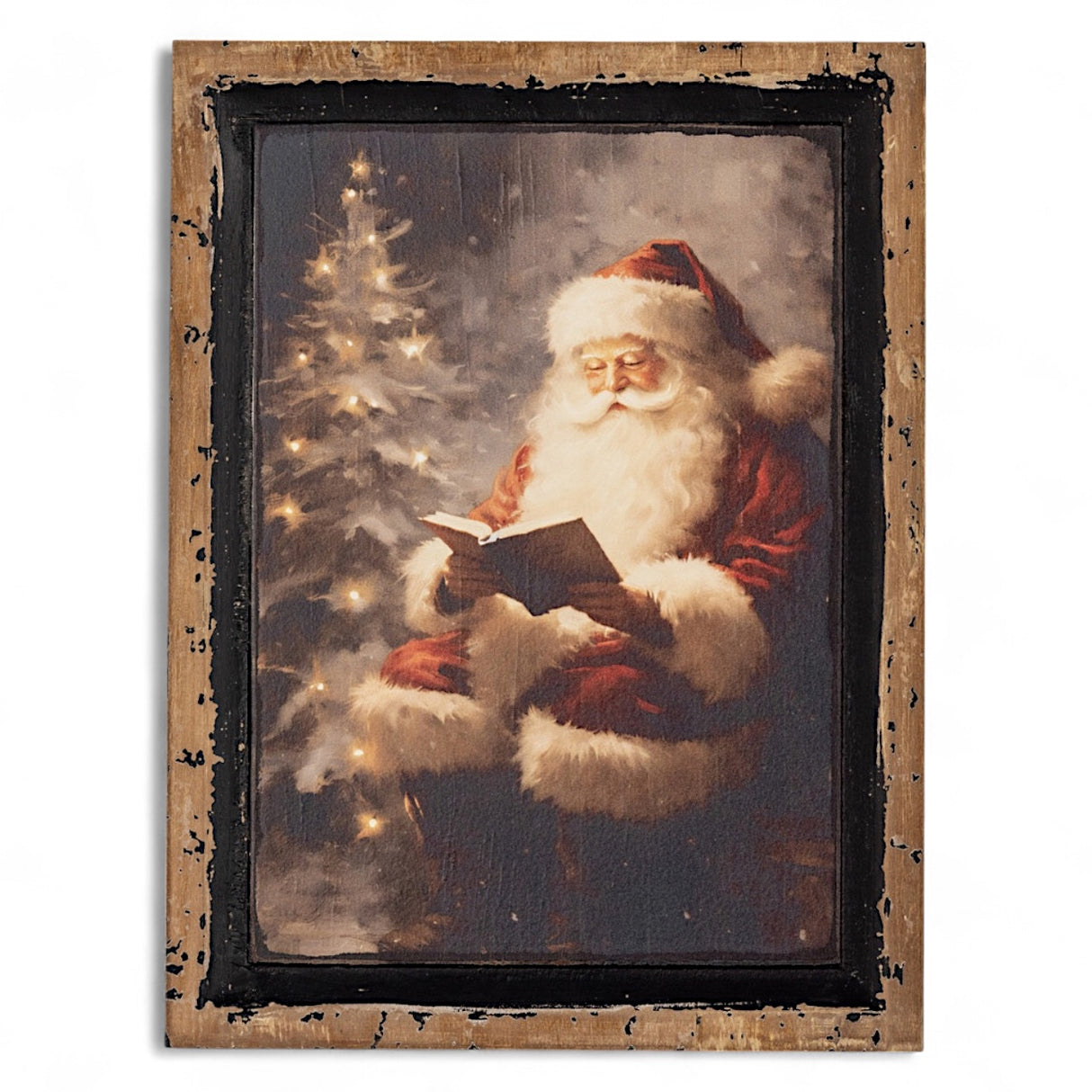 Framed artwork of Santa Claus reading a book next to a Christmas tree.