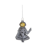 Glass Sitting Astronaut Ornament with Peace Sign & Silver Glitter