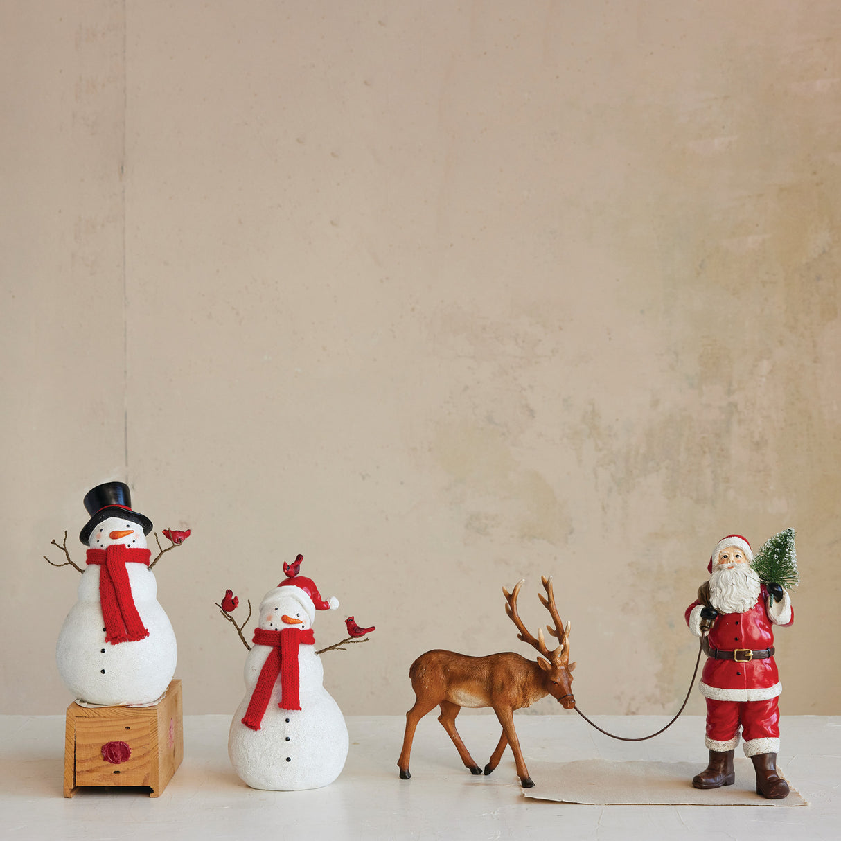Santa Leading Reindeer Resin Figurine