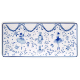 Rectangular white ceramic tray with blue ballerinas, a central nutcracker, leafy garlands, bows, stars, and a thin blue border