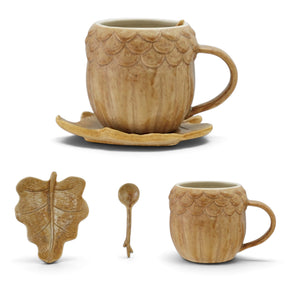 Brown acorn shaped ceramic mug with leaf saucer and spoon for fall