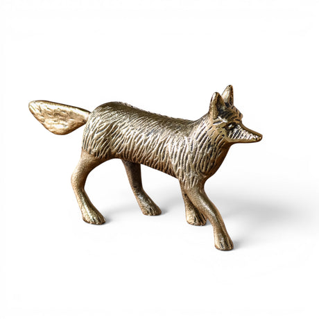 Antique gold aluminum fox figurine with textured fur details