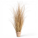 35-inch artificial tan grass in a neutral pot styled as fall mantel décor