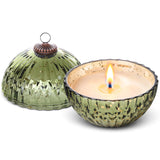  ILLUME Balsam & Cedar candle in a ribbed green mercury glass ornament vessel with a matching lid and metal loop.
