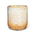 Balsam & Cedar candle in a cylindrical glass vessel with a reflective gold-speckled finish and rounded base