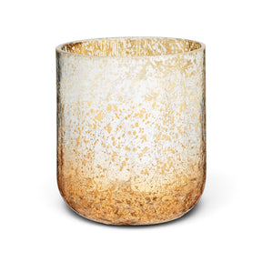 Balsam & Cedar candle in a cylindrical glass vessel with a reflective gold-speckled finish and rounded base
