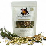 Be Cozy simmer mix with jasmine, cardamom, lime, cedar, and bay leaf in 4oz pouch