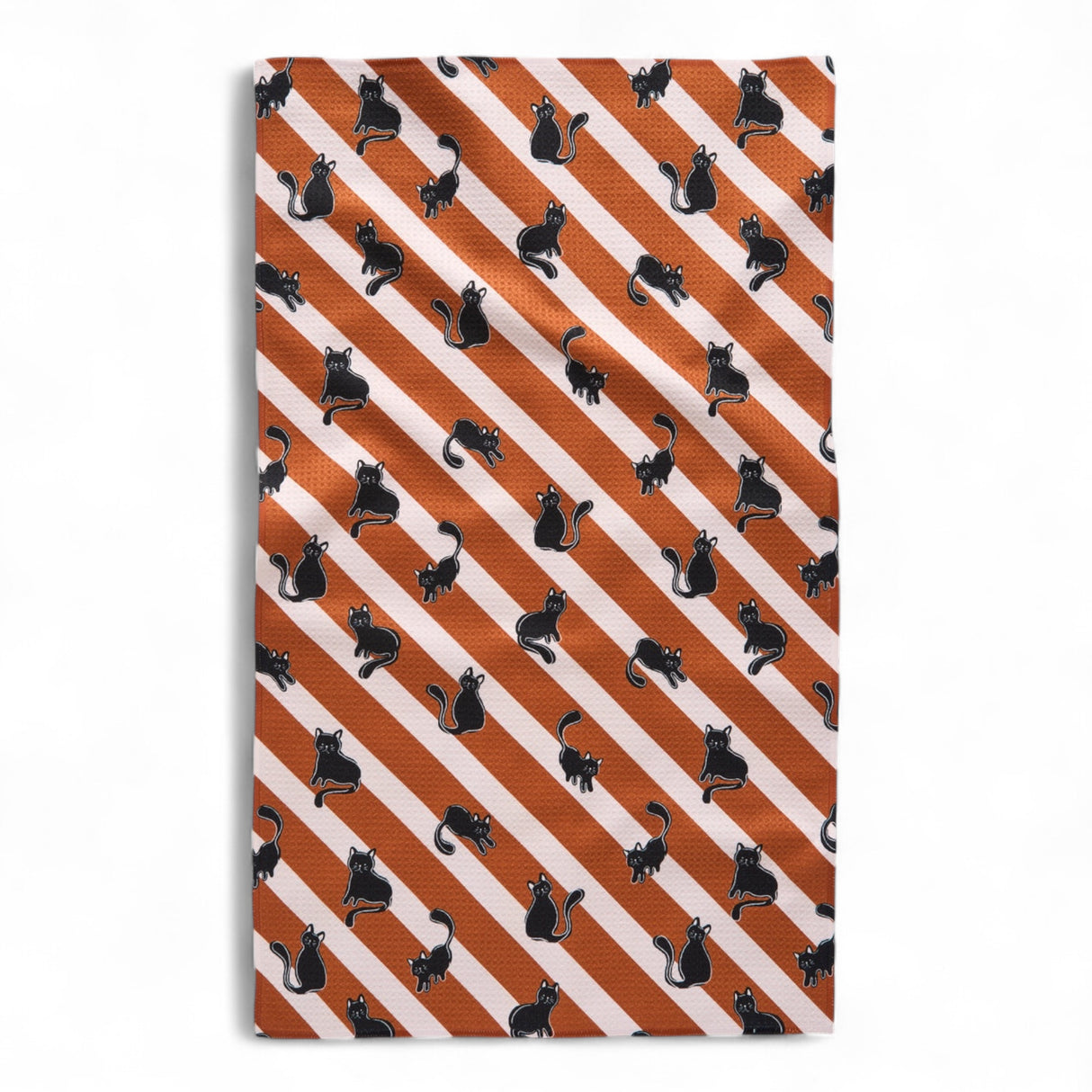 black cat pattern on orange and white striped tea towel