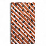 black cat pattern on orange and white striped tea towel