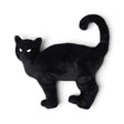 faux fur cat-shaped Halloween pillow with curled tail and white eyes