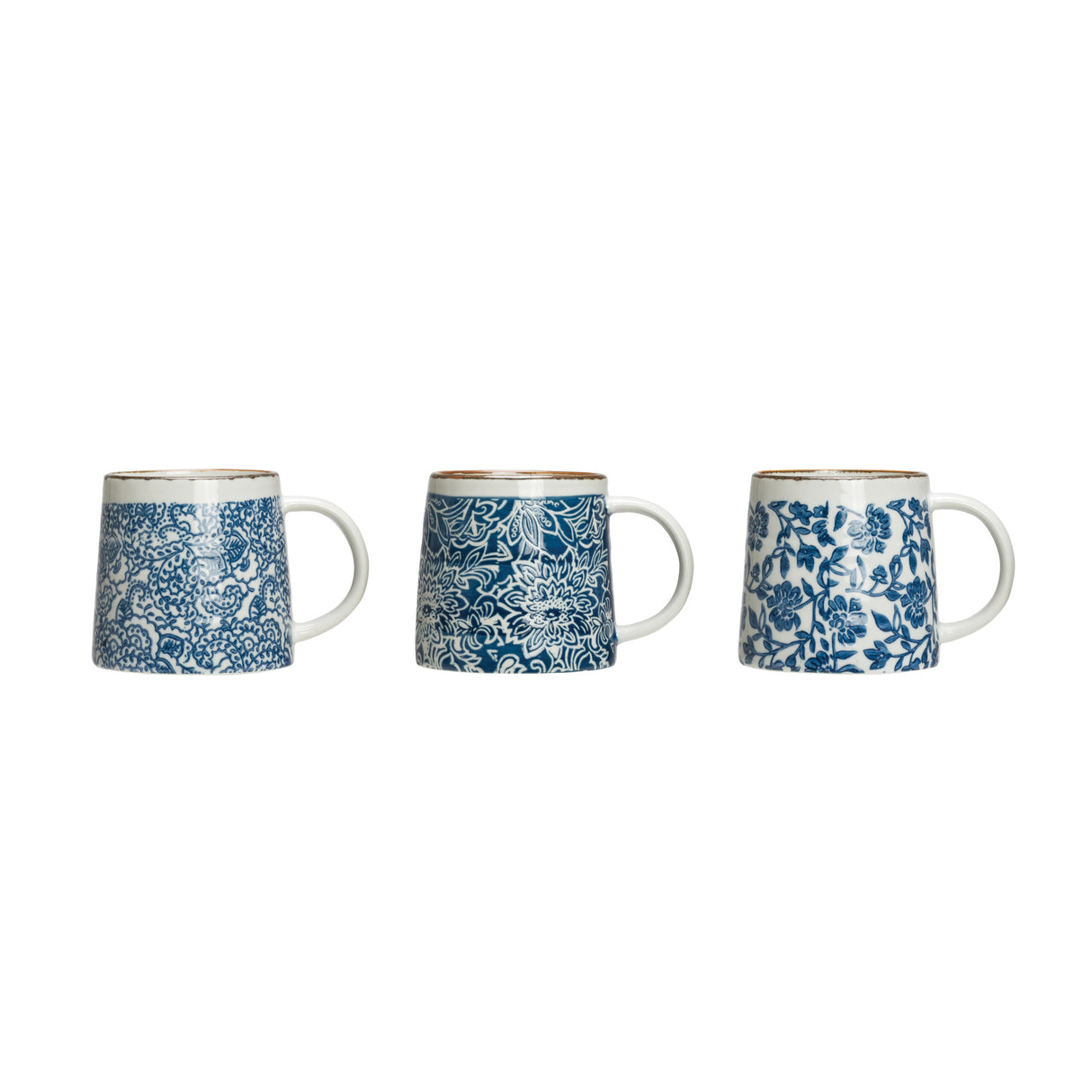 blue floral pattern stamped coffee mug by creative co-op