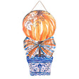 Blue and orange pumpkin fall door hanger with plaid bow and blue white planter made from recycled PVC