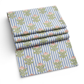 Blue striped floral table runner 16 x 60 by Geometry with pink flowers and green stems
