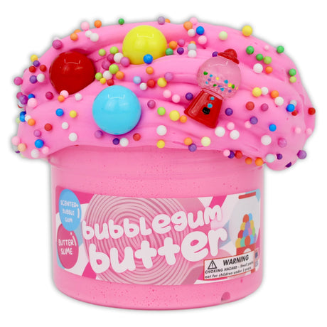 Pink bubblegum butter slime with gumball charms and rainbow foam beads in clear dome lid