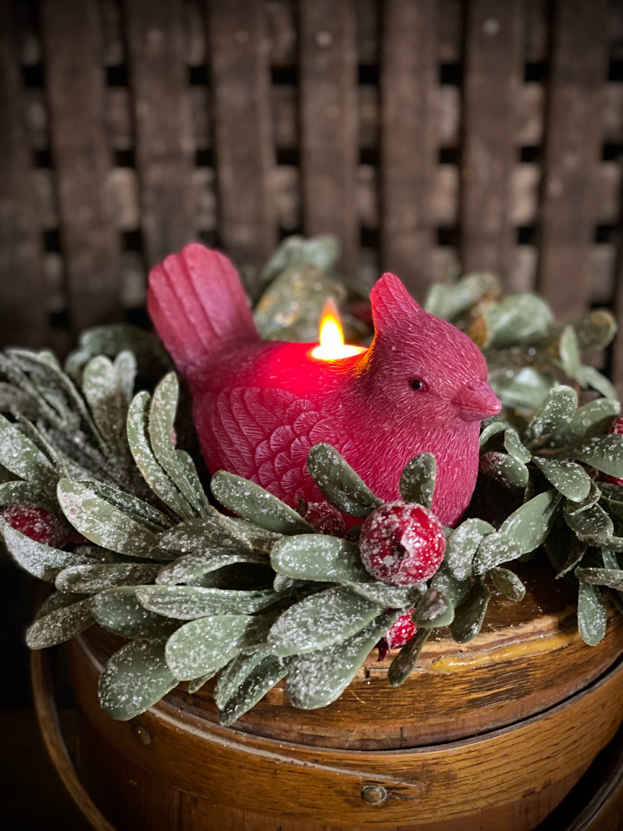 Red cardinal shaped LED candle with moving flame
