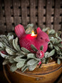 Red cardinal shaped LED candle with moving flame