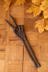 14-inch cast iron skeleton peace sign Halloween decor