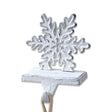 White distressed cast iron snowflake stocking holder 7 inches tall