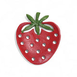 Cast iron strawberry shaped soap dish in red and green with drainage holes