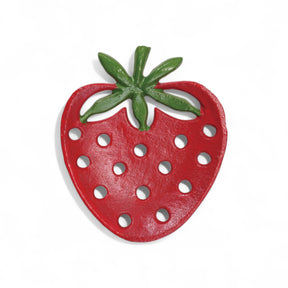 Cast iron strawberry shaped soap dish in red and green with drainage holes