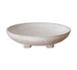 Neutral-toned cement footed bowl with distressed finish, ideal for tabletop decor.