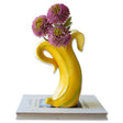 Ceramic vase shaped like a banana cluster, ideal for kitchen or eclectic home decor.