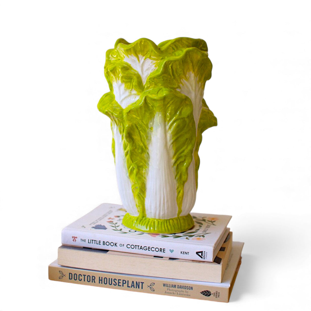 Green and white ceramic lettuce vase