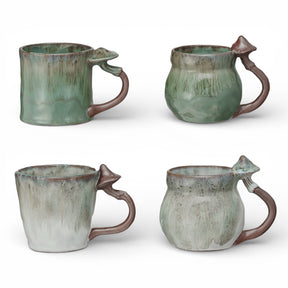 Reactive glaze ceramic coffee mug with mushroom shaped handle