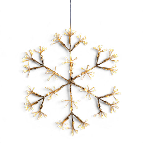 Champagne-toned hanging snowflake light with 96 warm white LEDs and a 10-inch illuminated diameter.