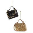 Glass handbag ornaments in black and gold with quilted pattern and gold chain handles.