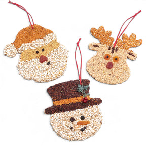 Christmas cookie bird seed treats in Frosty, Rudolph, and Santa designs with red raffia hangers, each sold individually.
