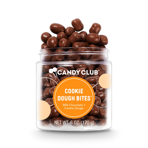 Jar of Cookie Dough Bites candy with milk chocolate–covered cookie dough pieces in a small cup, made in the USA