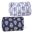 Quilted cotton block print cosmetic pouch with zipper closure in blue floral print for travel, makeup, and toiletry storage.