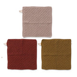 Cotton knit dish cloth set in rust, mustard, and oatmeal