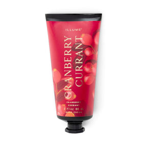 ILLUME Cranberry Currant Demi Hand Cream in a red 3 fl oz tube with berry illustrations, gold lettering, and a black cap