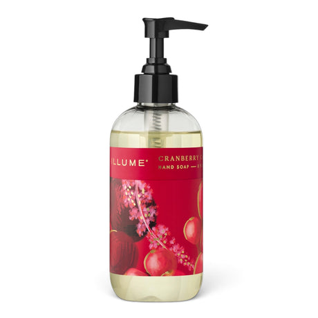  ILLUME Cranberry Currant hand soap in a clear 8 fl oz bottle with a black pump and red botanical label with gold accents