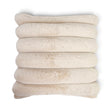 Cream square faux fur pillow with wide horizontal ribbing and a plush textured front.