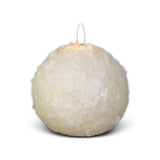 Cream shimmer snowball candle with a rounded body and 3D flame for winter and Christmas decor.