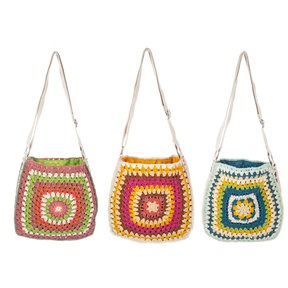 Handmade crochet granny square purse with an adjustable strap