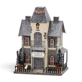 Lighted Dead and Breakfast Halloween village house with ghost accents, glitter finish, and spooky miniature details