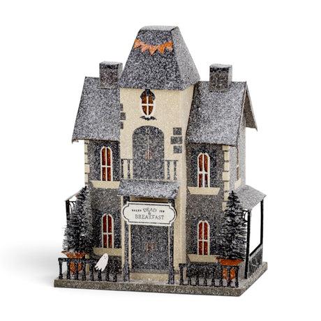 Lighted Dead and Breakfast Halloween village house with ghost accents, glitter finish, and spooky miniature details