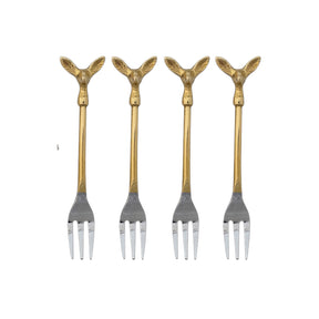  Four appetizer forks with gold-toned deer head handles and silver-toned tines beside an illustrated drawstring bag