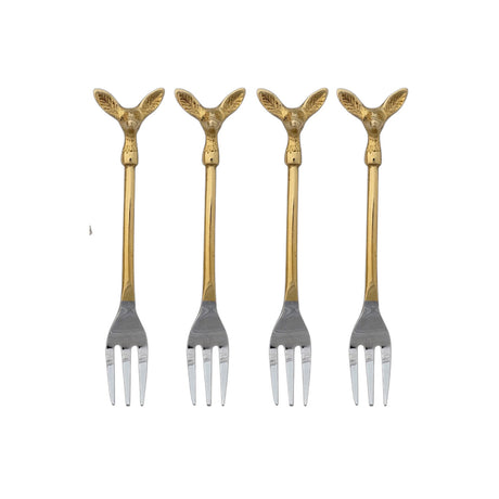  Four appetizer forks with gold-toned deer head handles and silver-toned tines beside an illustrated drawstring bag
