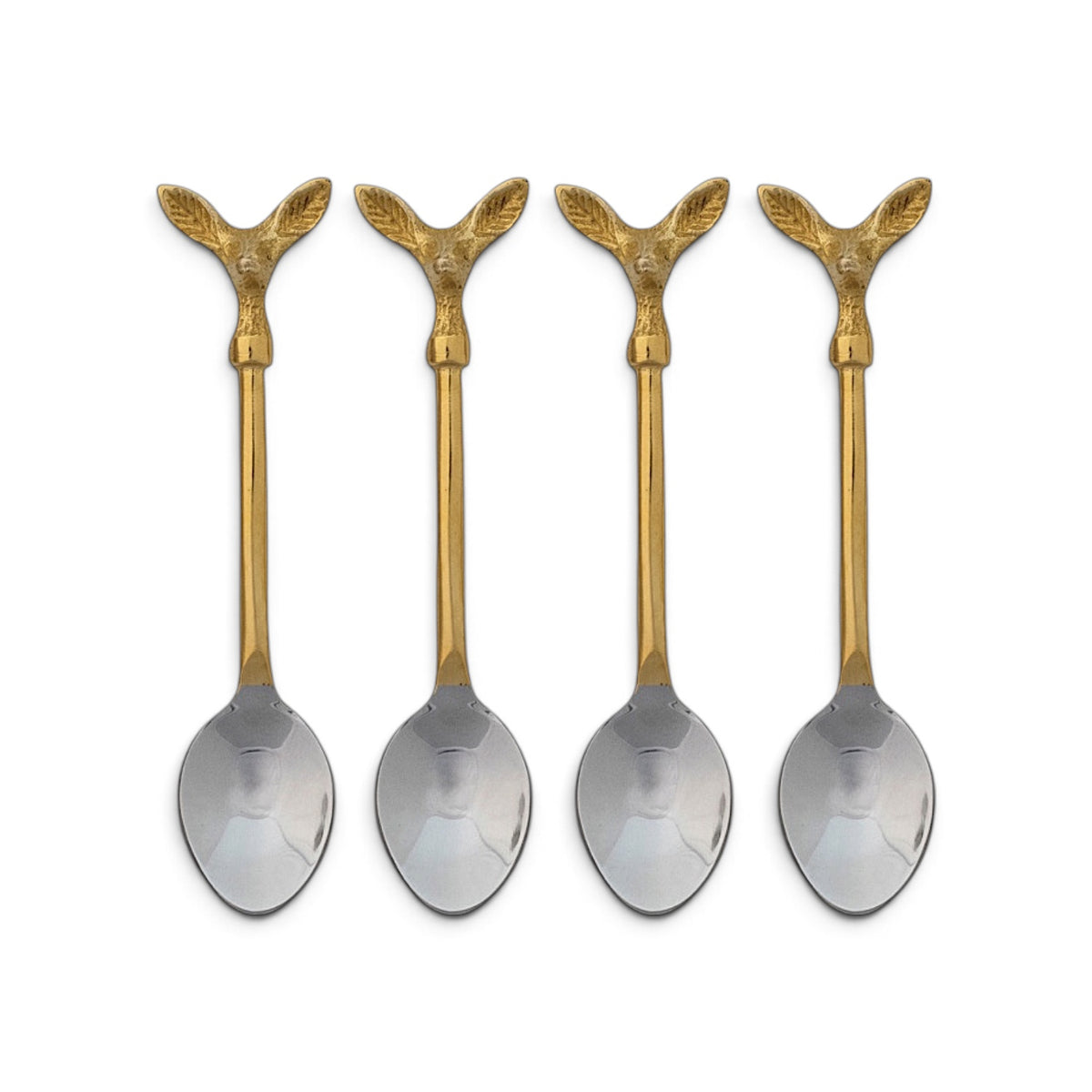  Four coffee spoons with gold-toned deer head handles and silver-toned bowls beside a cream printed drawstring bag