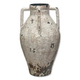 Heavily distressed white metal urn with handles, rustic vintage-style vase