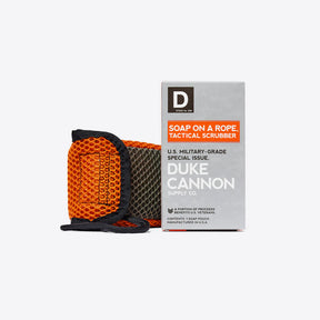 Duke Cannon tactical soap scrubber pouch with dual-mesh design and paracord loop